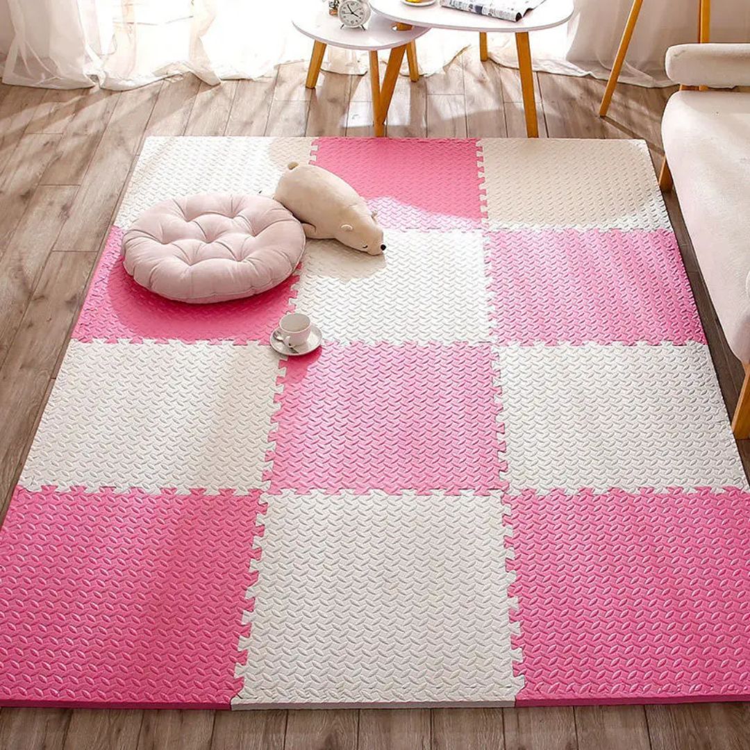 Tapis mousse puzzle rose blanc